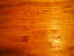 Figured Cherry floor just after it has been finished with two coats of Shellac.